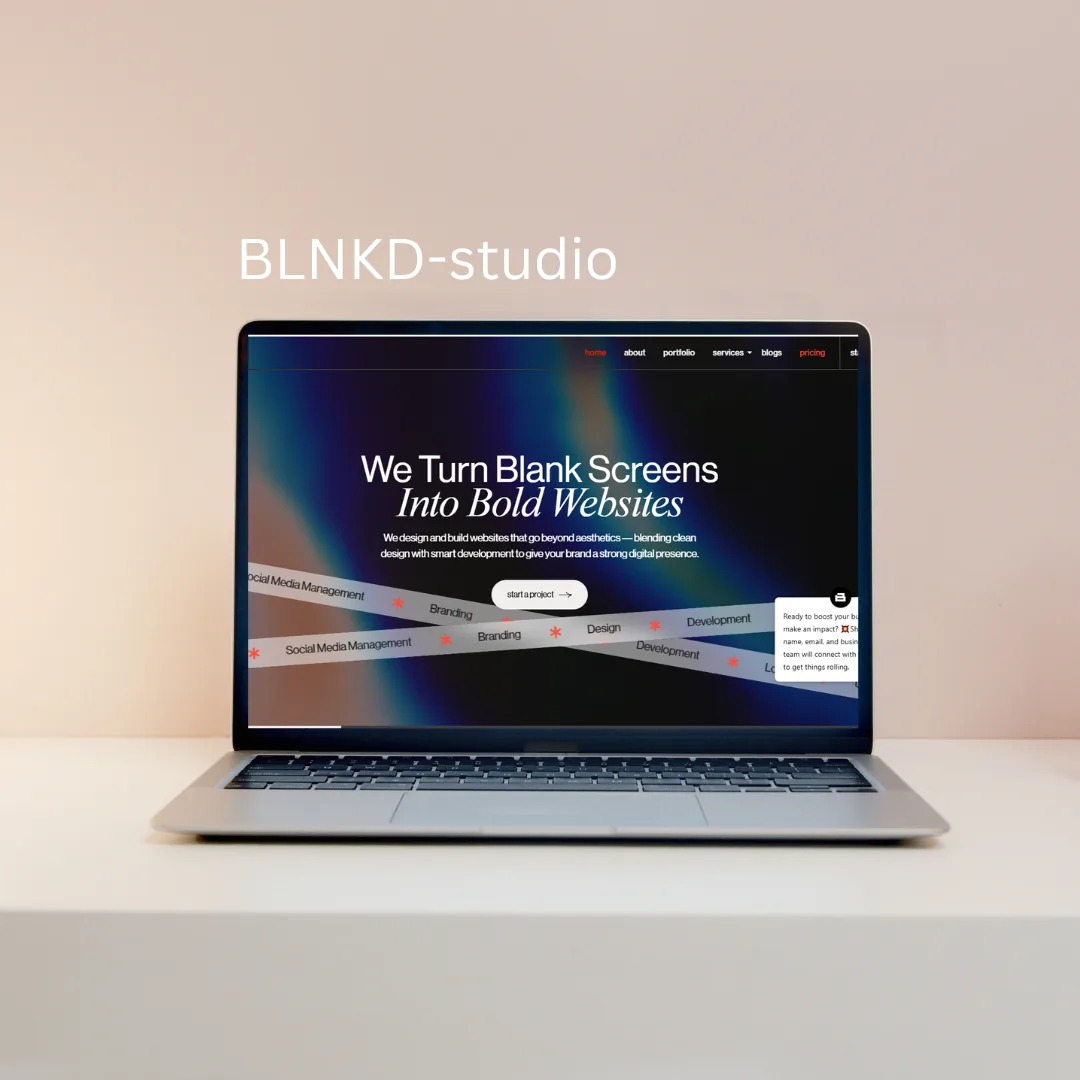 BLNKD Studio website shown in a notebook mockup