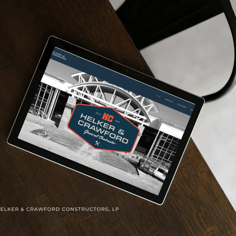 Helker & Crawford Constructors website shown on a tablet